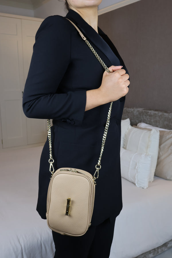 The AVAIA Petit Noir worn crossbody, vertical