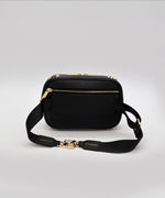 Load image into Gallery viewer, The passthrough strap of a noir AVAIA Petit bag, with the fabric strap that for bumbags.