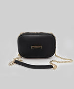Load image into Gallery viewer, A AVAIA Petit noir, with the padded gold chain strap attached, on a white studio background.