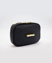 A slight side of of a AVAIA Petit noir on a white studio backdrop.