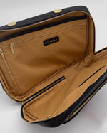 Load image into Gallery viewer, Open AVAIA Noir with beige interior and gold zippers on a white background