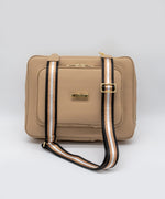 Load image into Gallery viewer, AVAIA signature bag in creme caramel, with a striped shoulder strap on a white background.

