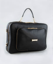 The LIAVELLA signature AVAIA bag in Noir featuring a wrist strap in the same colour, against a white background.