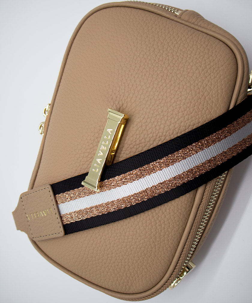 AVAIA Petit bag in creme caramel with a strap and visible brand logo on a light background.