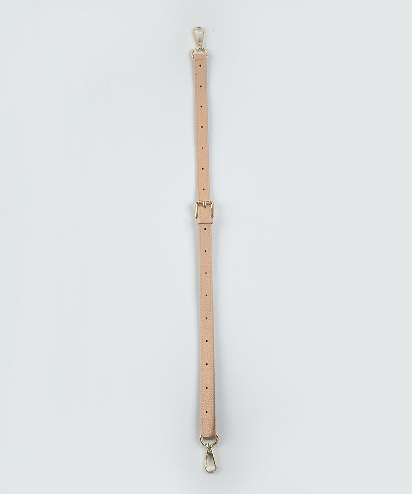 One crème caramel long leather strap.